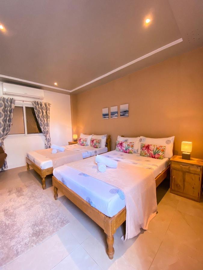 Bella'S Guest House Pooc Exterior foto